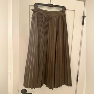 Green pleated faux leather skirt